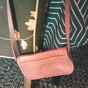 A vintage( rare color) lavender Coach Crossbody purse